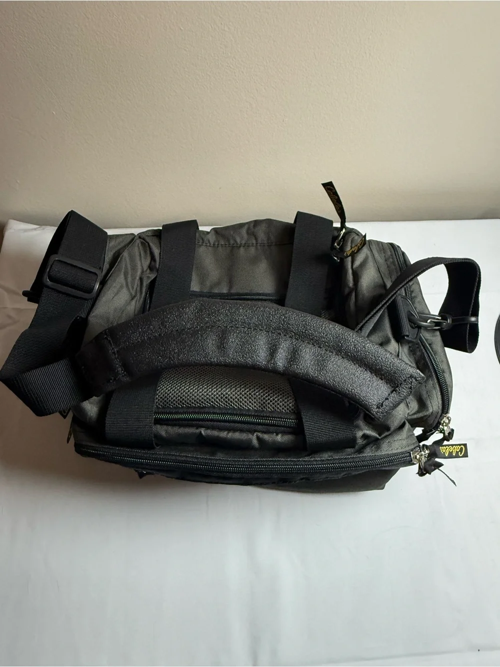 Cabela's Olive Green and Black Duffel Bag with Yellow Logo